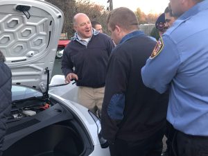 Jason Emery explaining a Tesla Model 3