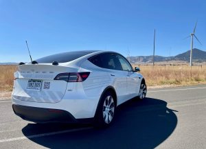 Boulder, CO Model Y with Wind Turbines